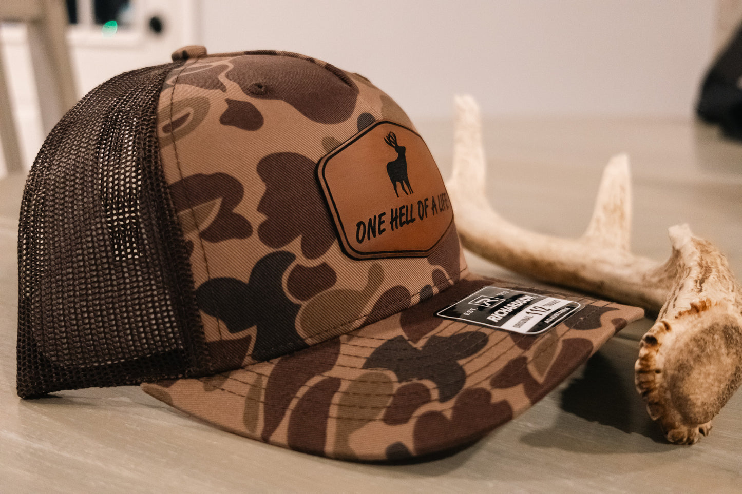 One Hell of a Life Old School Camo Buck Trucker Hat