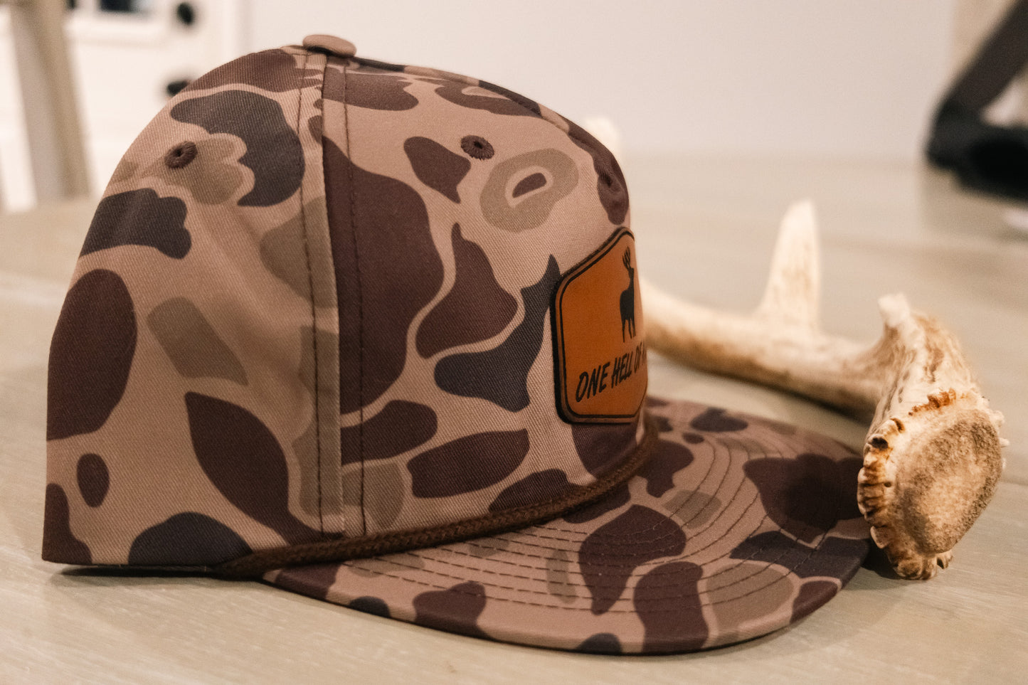 One Hell of a Life Old School Camo Buck Rope Hat x OHOAL Outdoor Podcast Coozie
